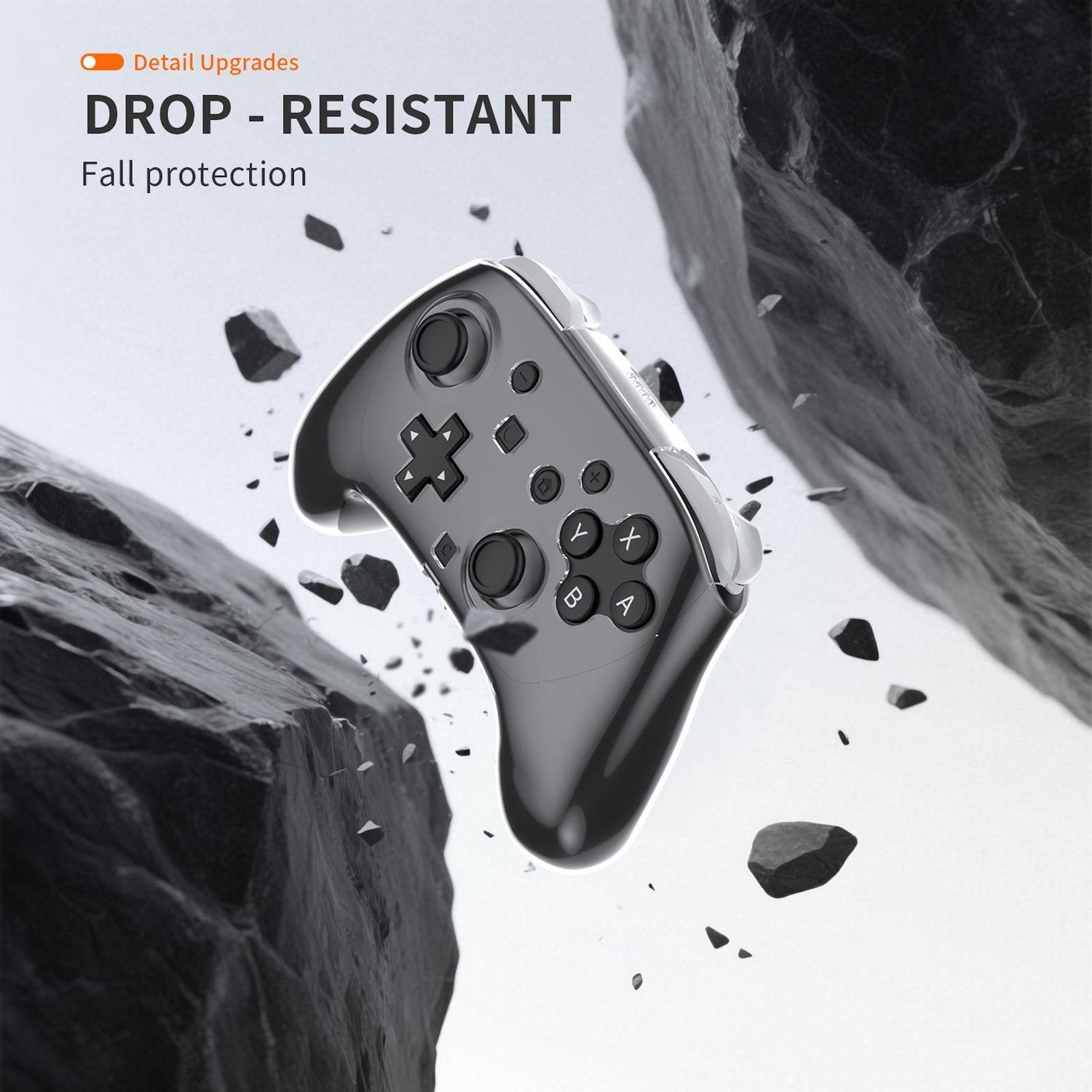 Un mando de juego gris cae entre rocas grises. Las palabras 'DROP - RESISTANT' están arriba, 'Fall protection' debajo.