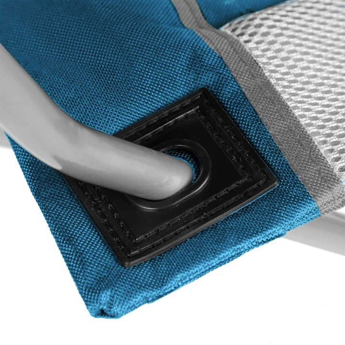 Close-up of a blue fabric with a gray metal bar going through a black square. White mesh and a gray edge are visible.