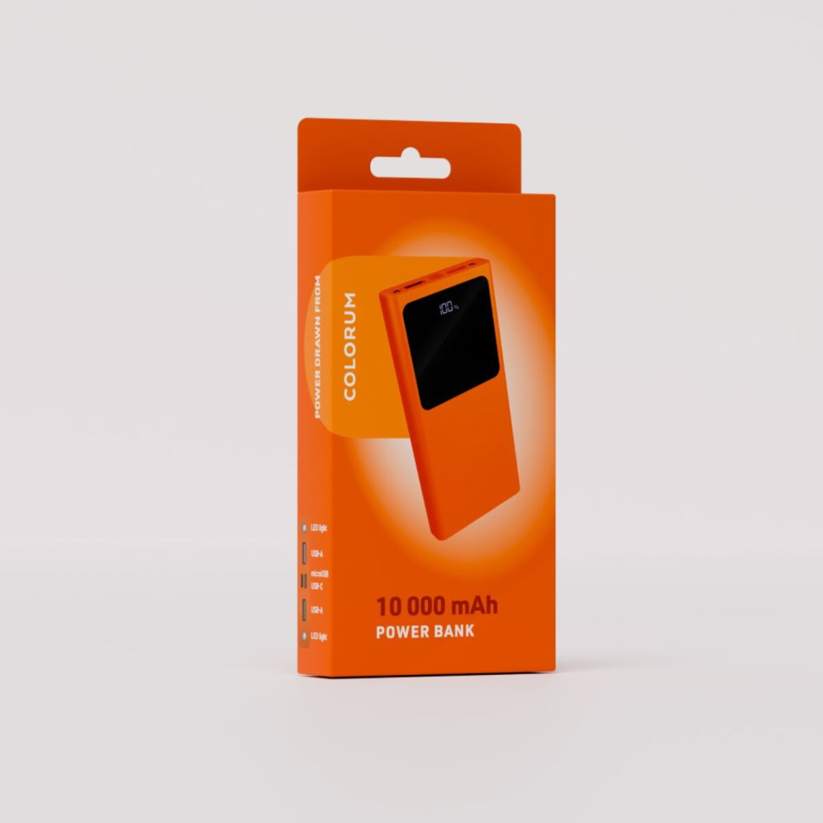 Eine orangefarbene Powerbank in einer Schachtel. Die Schachtel und die Powerbank sind orange. Die Powerbank hat einen schwarzen Bildschirm mit 100%.