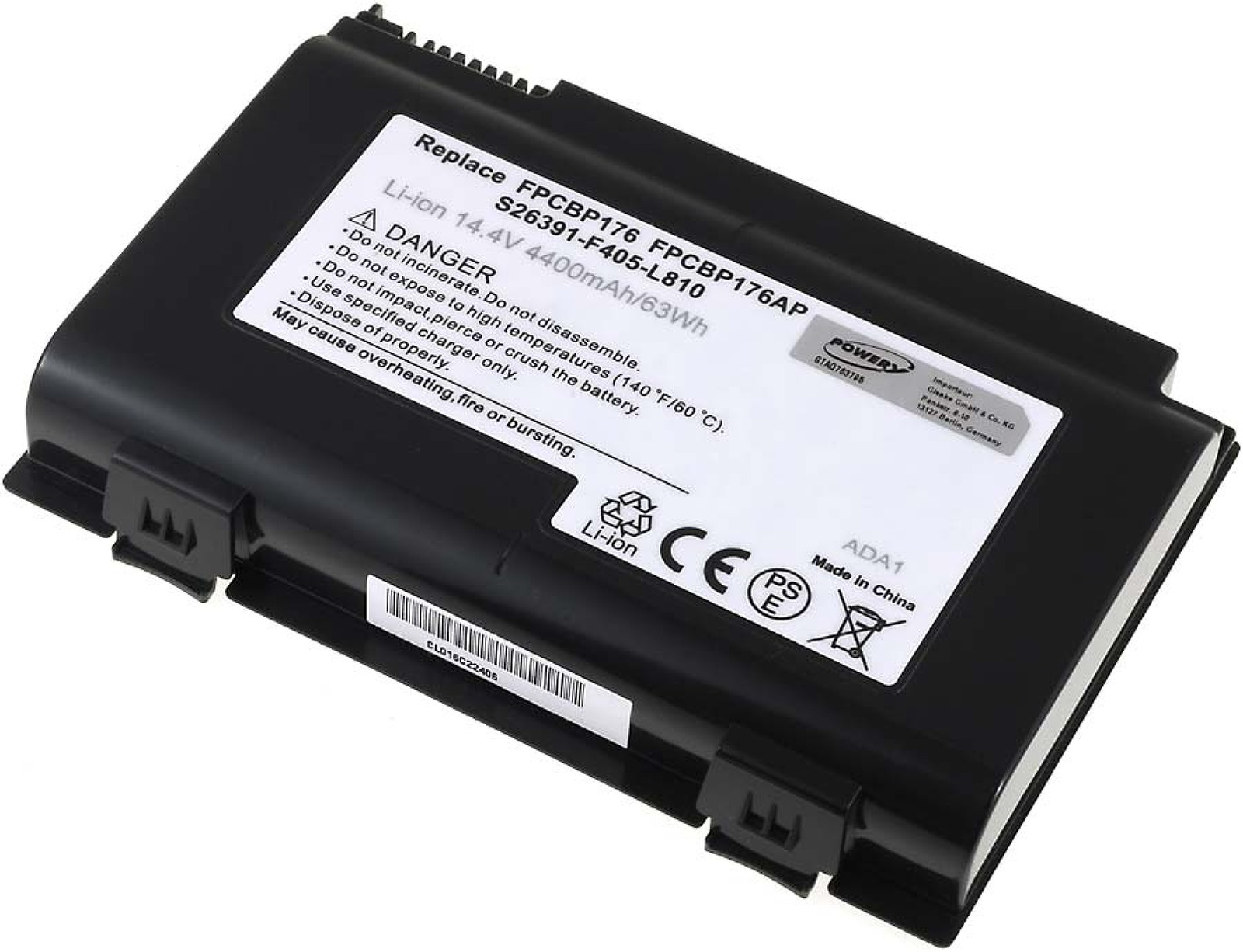 Una batería negra de portátil con etiquetas de advertencia y detalles técnicos. Tiene la marca y símbolos de seguridad.