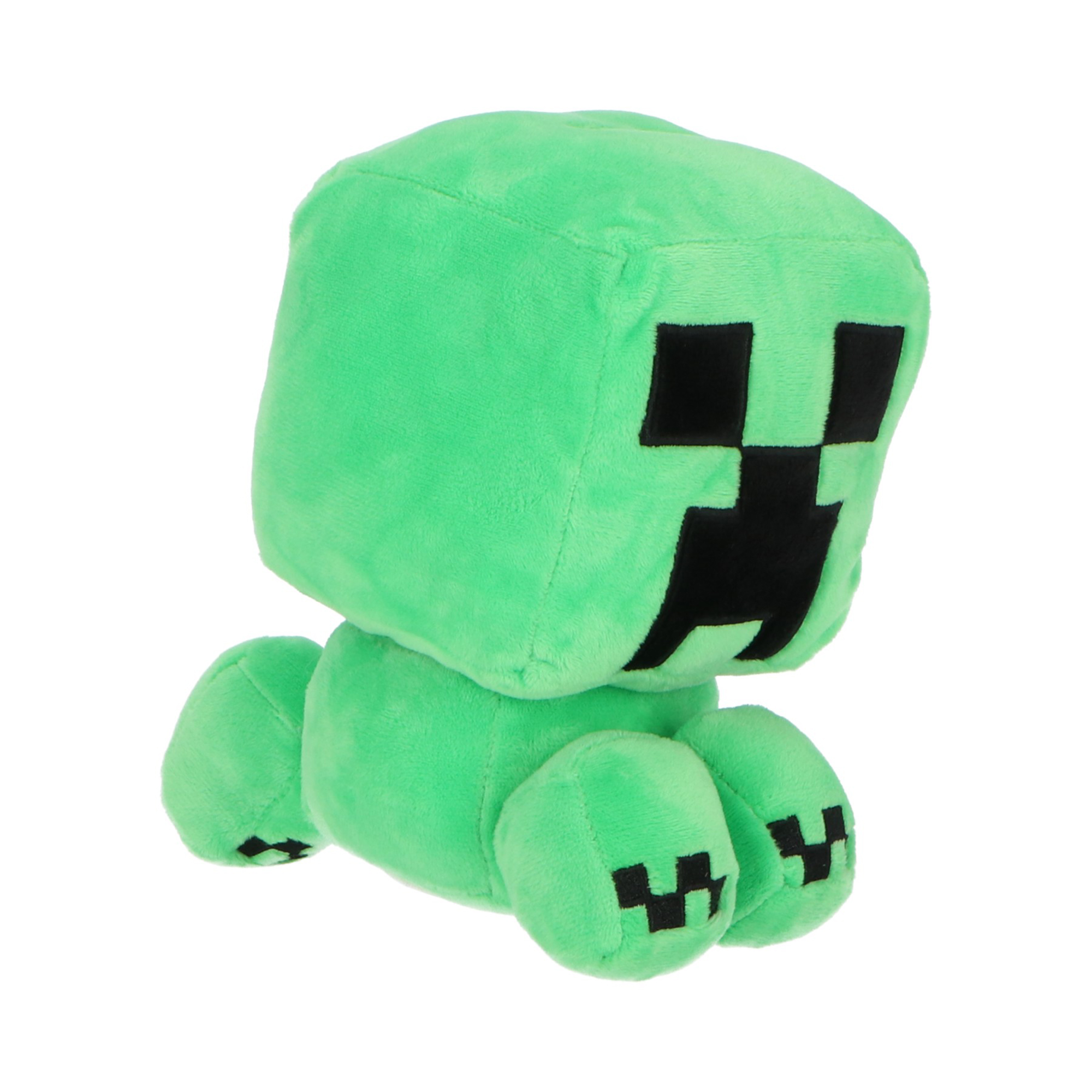 Un peluche Creeper verde di Minecraft, con lineamenti e piedi neri, su sfondo bianco.