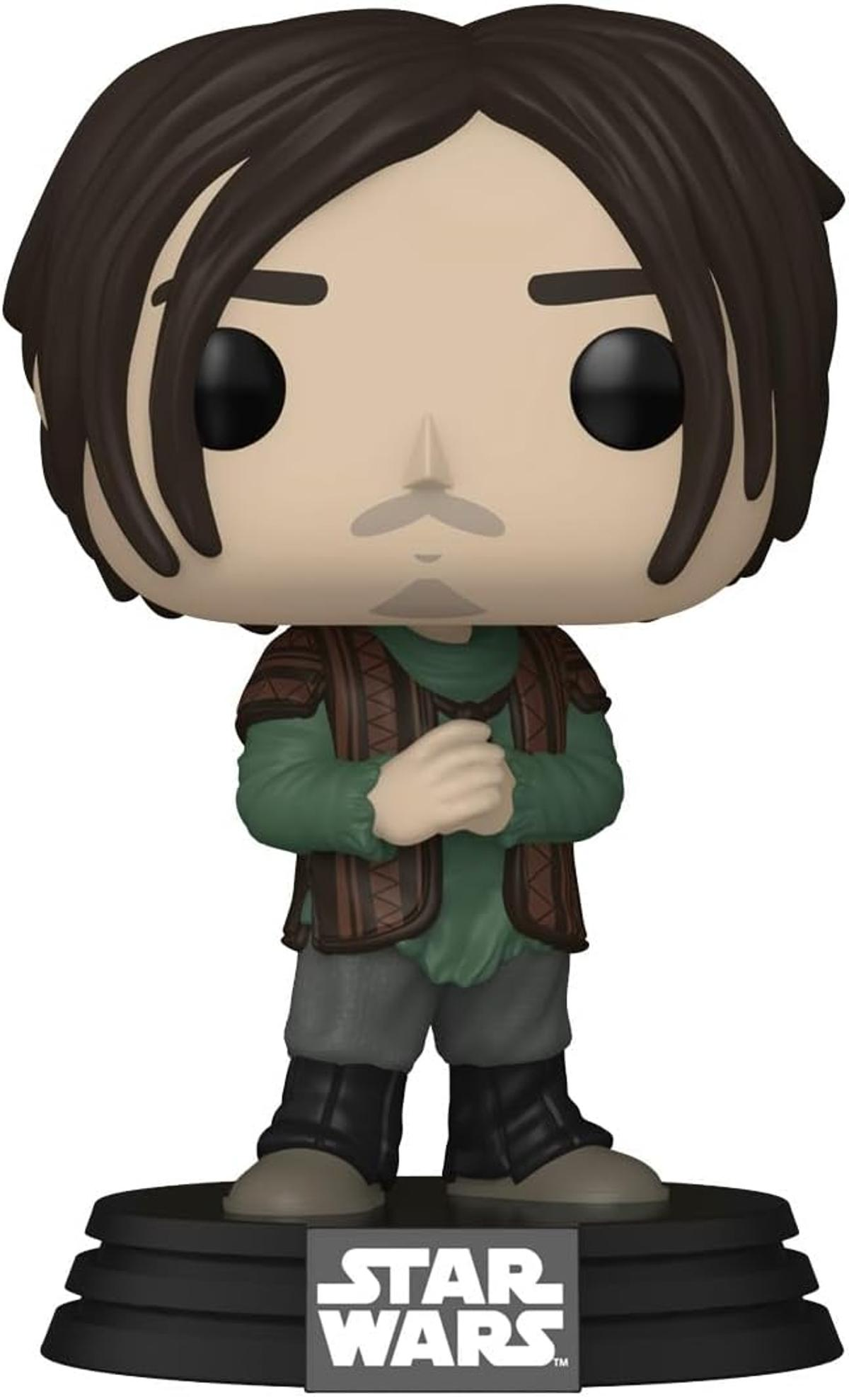 Una figura de Star Wars Funko Pop. La figura tiene pelo oscuro, una camisa verde, un chaleco marrón, pantalones grises y botas negras. Está sobre una base negra.