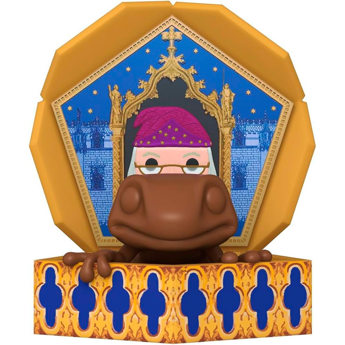 Un giocattolo a forma di rana di cioccolato con la testa di un mago in una scatola. Lo sfondo mostra Hogwarts e una cornice dorata.