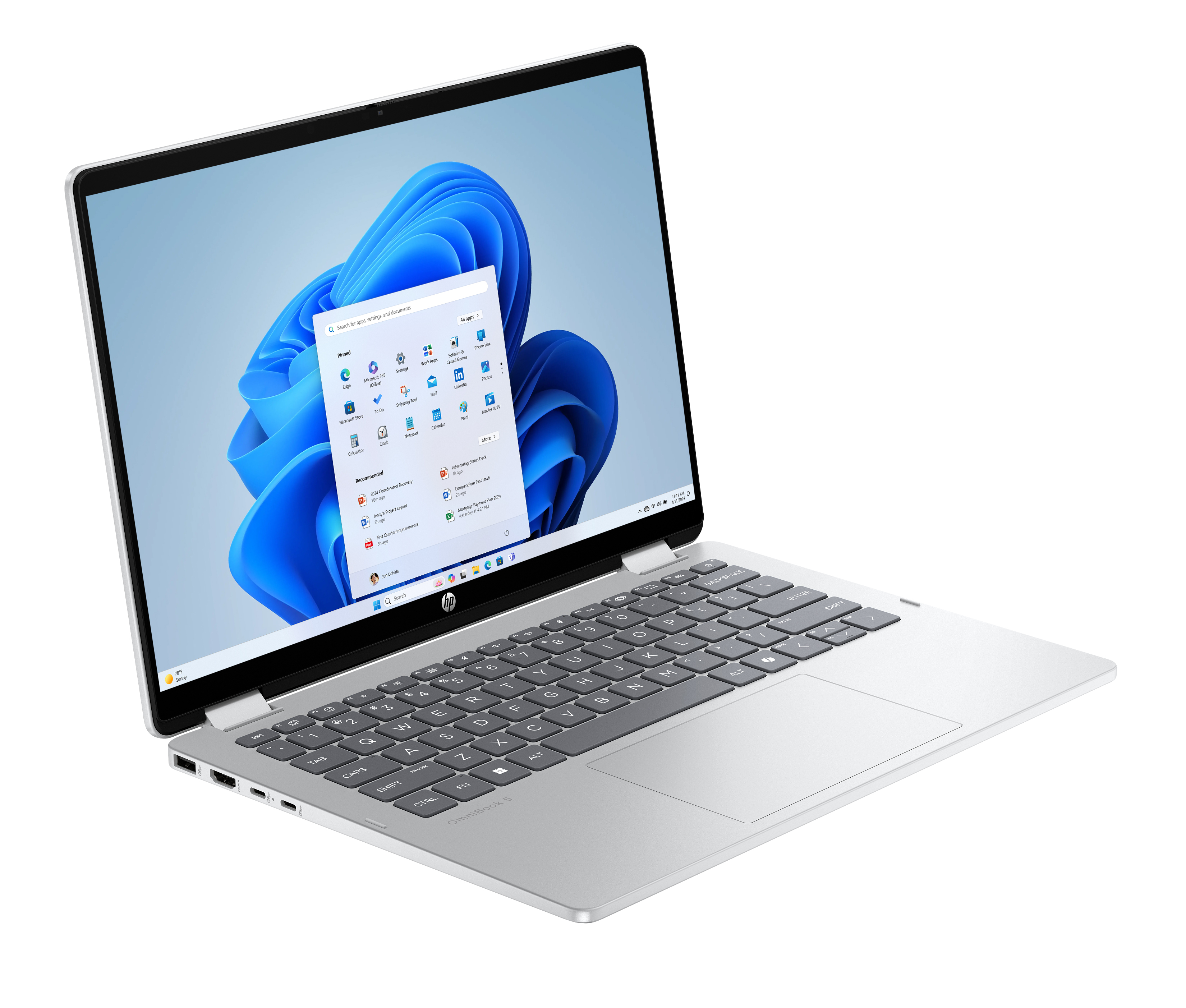 Silver HP OmniBook 5 laptop. The screen shows the Windows 11 start menu. Keyboard visible, with touchpad.