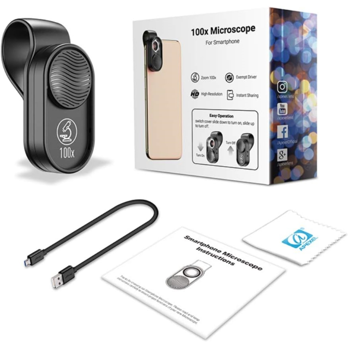 Ein Smartphone-Mikroskop-Kit mit schwarzem Aufsteckobjektiv, Box, USB-Kabel, Reinigungstuch und Anweisungen auf weißer Oberfläche.