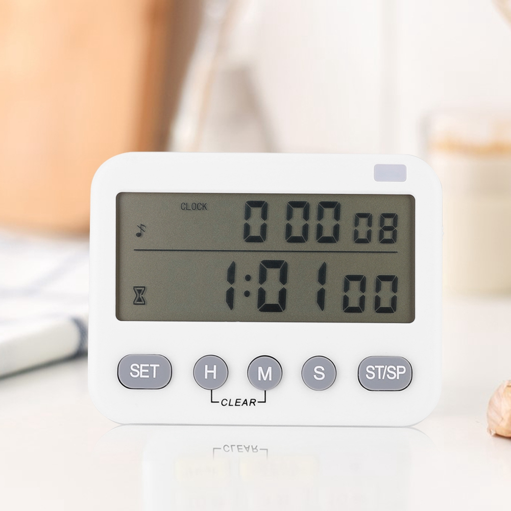 Ein weißer digitaler Küchentimer zeigt 0:00:08 und 1:01:00 an. Die Knöpfe sind mit SET, H, M, S und ST/SP beschriftet. Ein heller Hintergrund ist sichtbar.