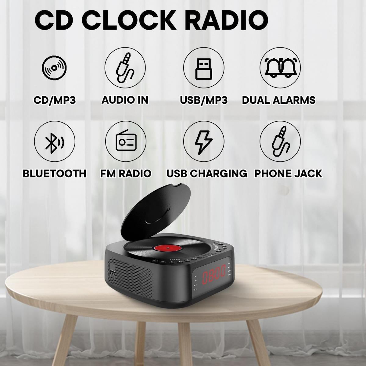 Ein schwarzes CD-Clock-Radio steht auf einem Holztisch. Es verfügt über CD/MP3, Audioeingang, USB/MP3, Dual-Alarme, Bluetooth, UKW-Radio und USB-Aufladung.