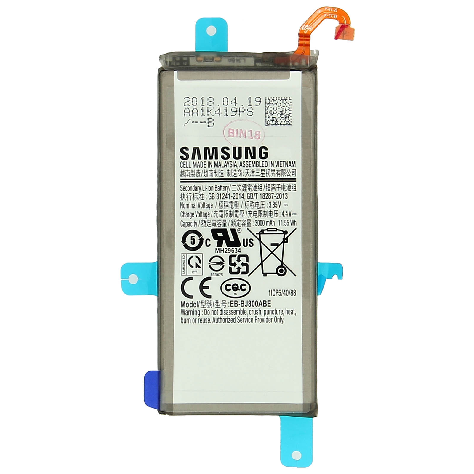 Ein Samsung-Akku mit Text, Seriennummer und Sicherheitshinweisen, gehalten von blauen Kunststoffhaltern.