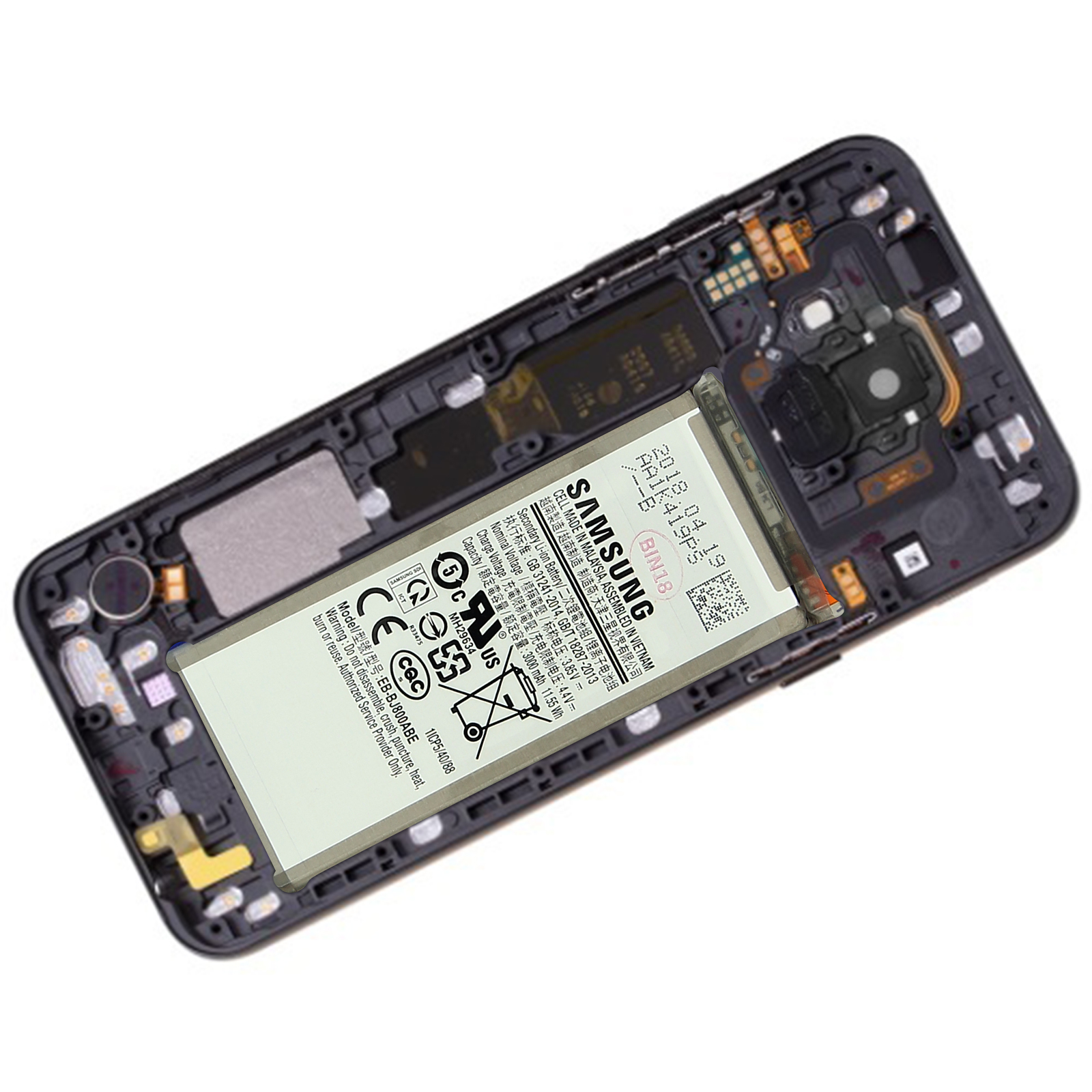 Zerlegtes Telefoninnere mit einem Akku mit der Aufschrift 'SAMSUNG'. Der Rahmen ist dunkel, der Akku hellgrün.