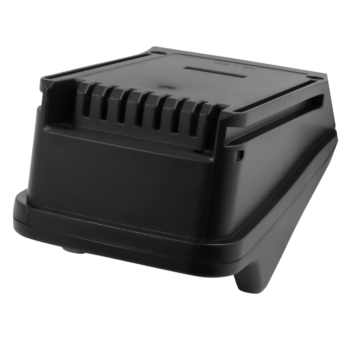 Eine schwarze Plastikbox mit geriffelter Oberseite und einem Schlitz. Die Box hat eine rechteckige Form mit abgerundeten Ecken und einer leicht abgewinkelten Basis.