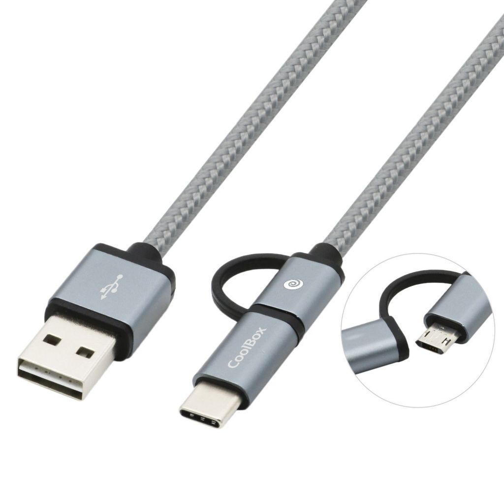 Un cable USB gris con un conector USB-A en un extremo y USB-C y micro-USB en el otro, el cable tiene un diseño trenzado.