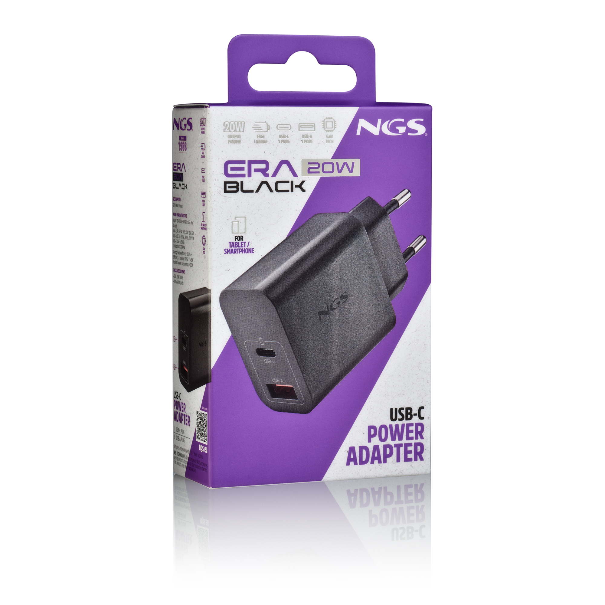 Un adaptador de corriente USB-C NGS Era 20W negro sobre una caja morada y blanca, con texto y un código QR.