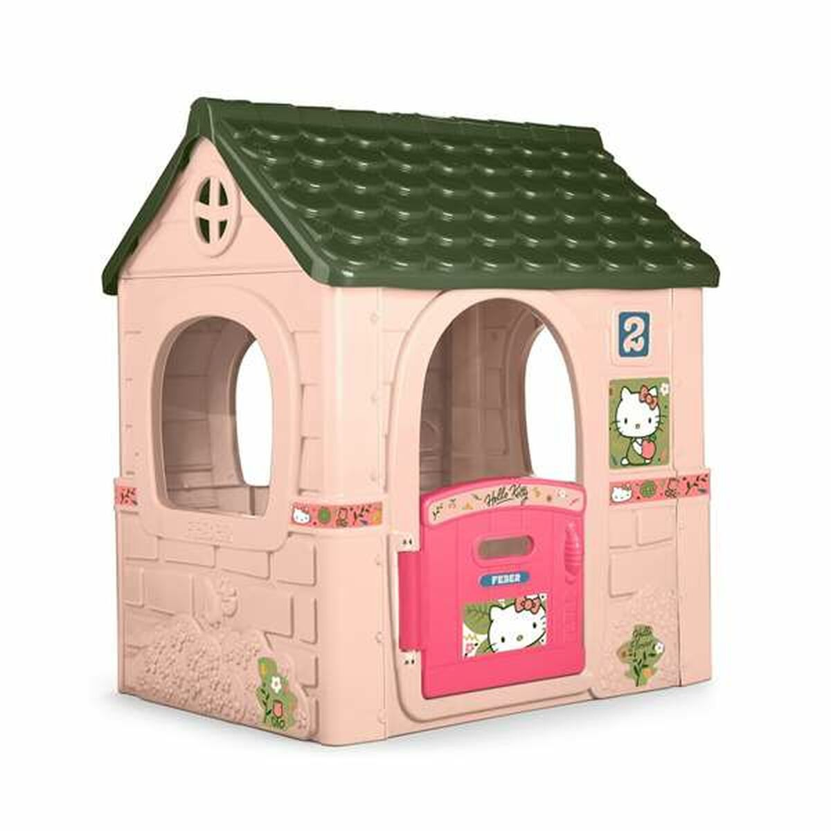 Una casita de juegos de Hello Kitty con exterior rosa, techo verde y puerta rosa. Cuenta con dos aberturas arqueadas y gráficos de Hello Kitty.