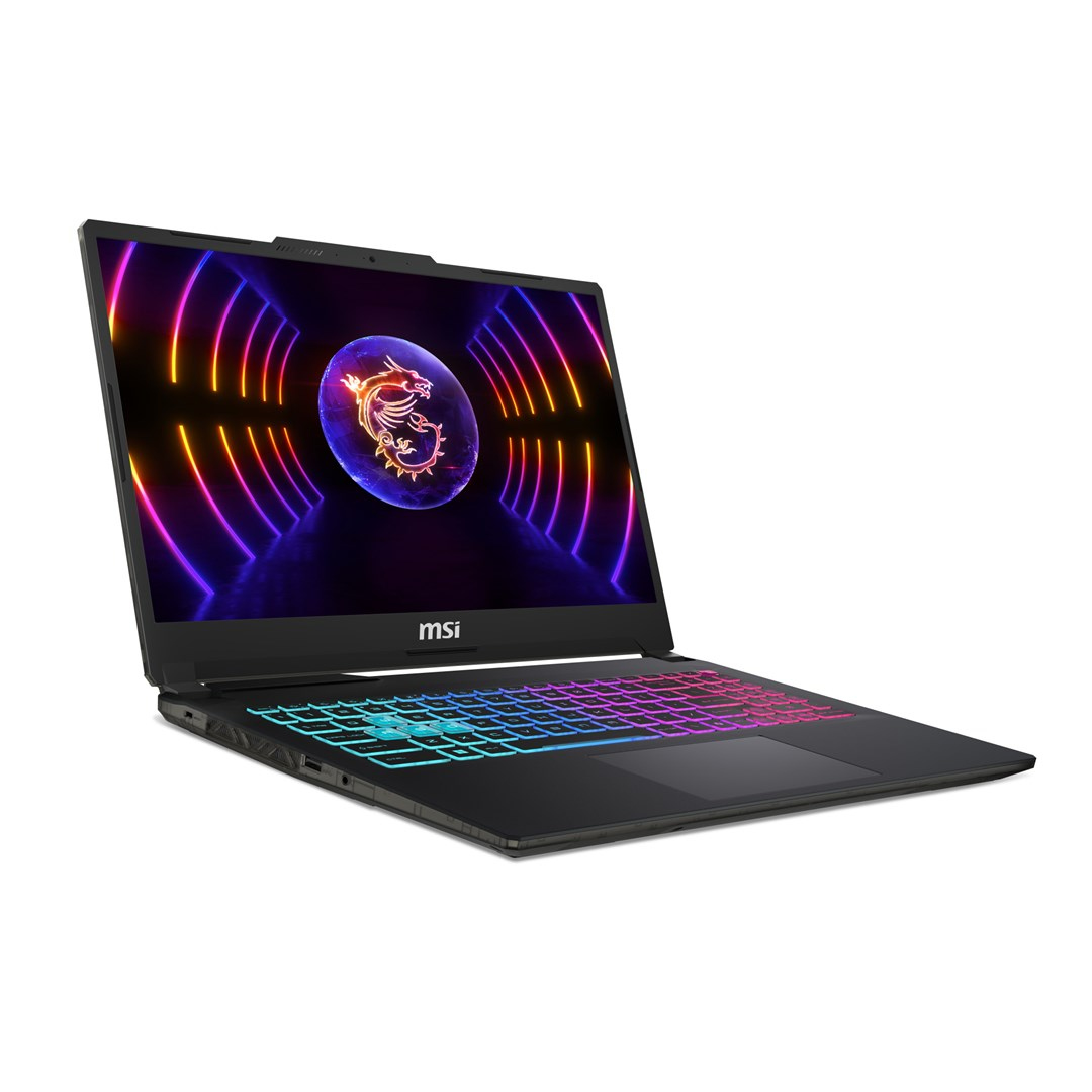 Czarny laptop MSI z kolorową klawiaturą, otwarty na białym tle. Ekran wyświetla logo smoka z neonami.