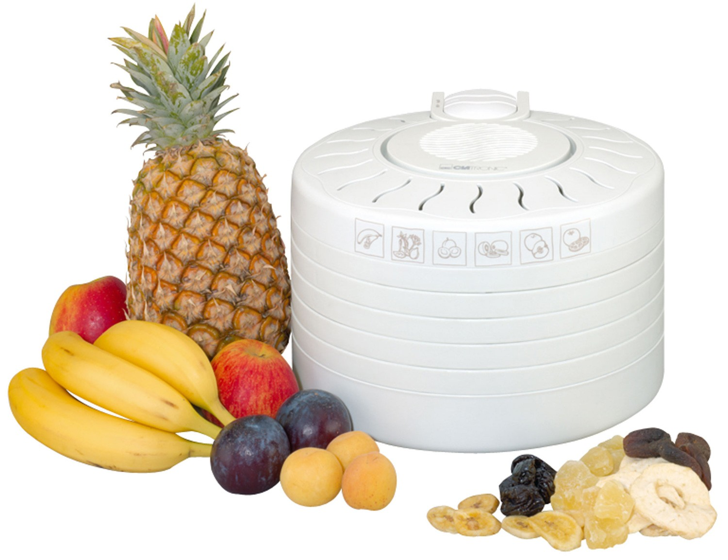 Biała suszarka do żywności otoczona świeżymi owocami, w tym ananasem, jabłkami, bananami, śliwkami i suszonymi owocami.