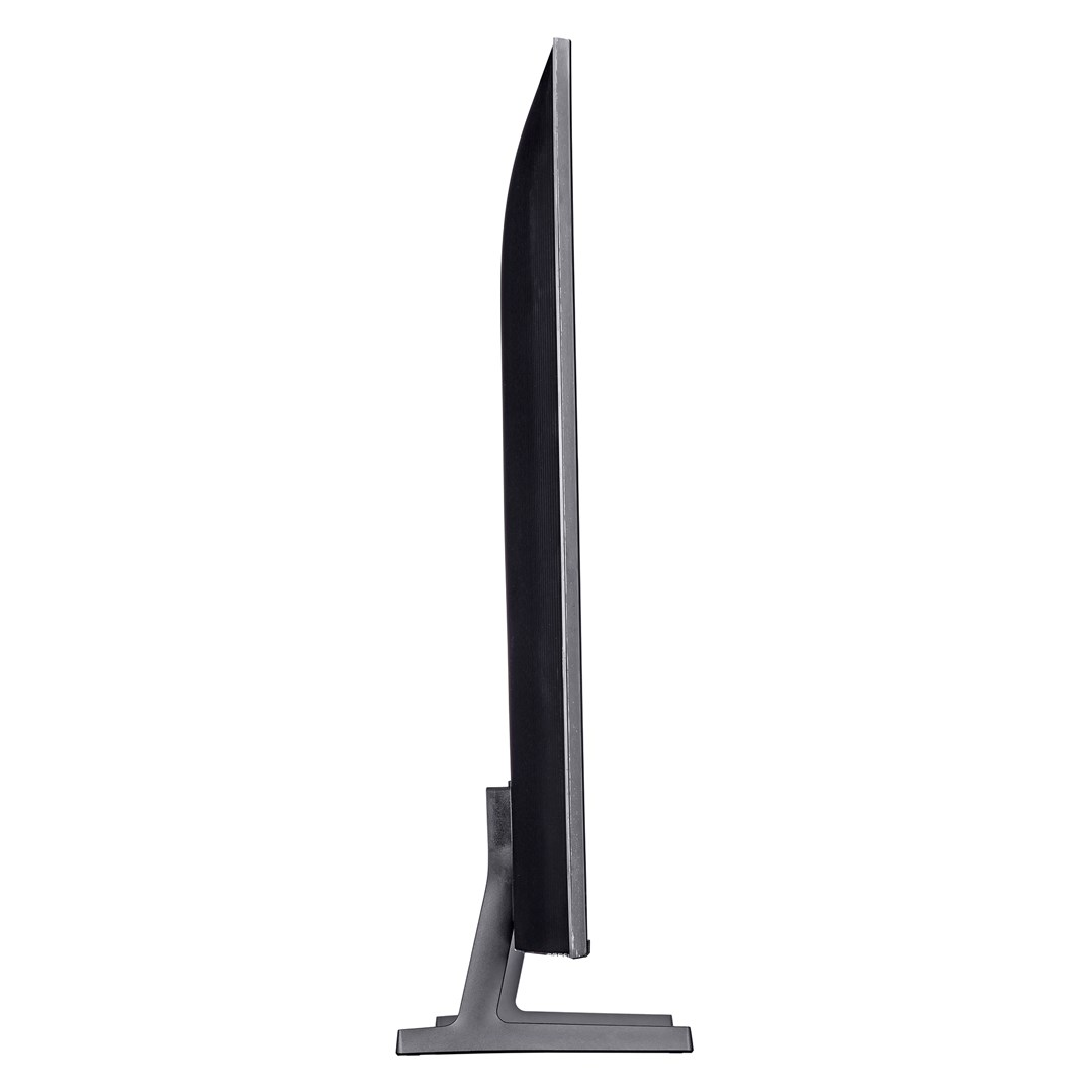 Una vista laterale di una TV nera e moderna. Ha una cornice sottile e un supporto argentato. Lo sfondo è bianco.