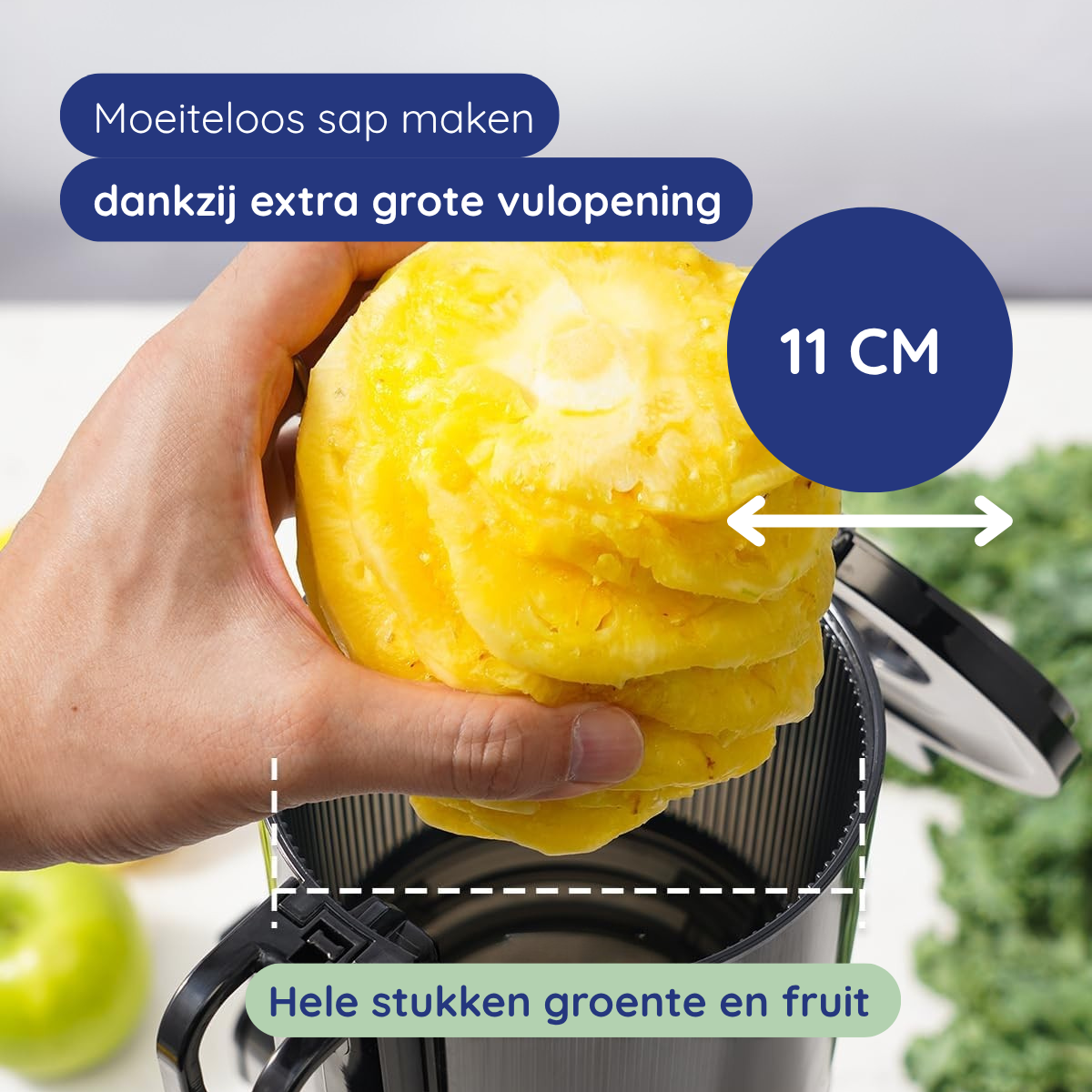 Hand holding pineapple over juicer. Text says: easy juicing thanks to extra large opening and whole pieces of fruit and vegetable