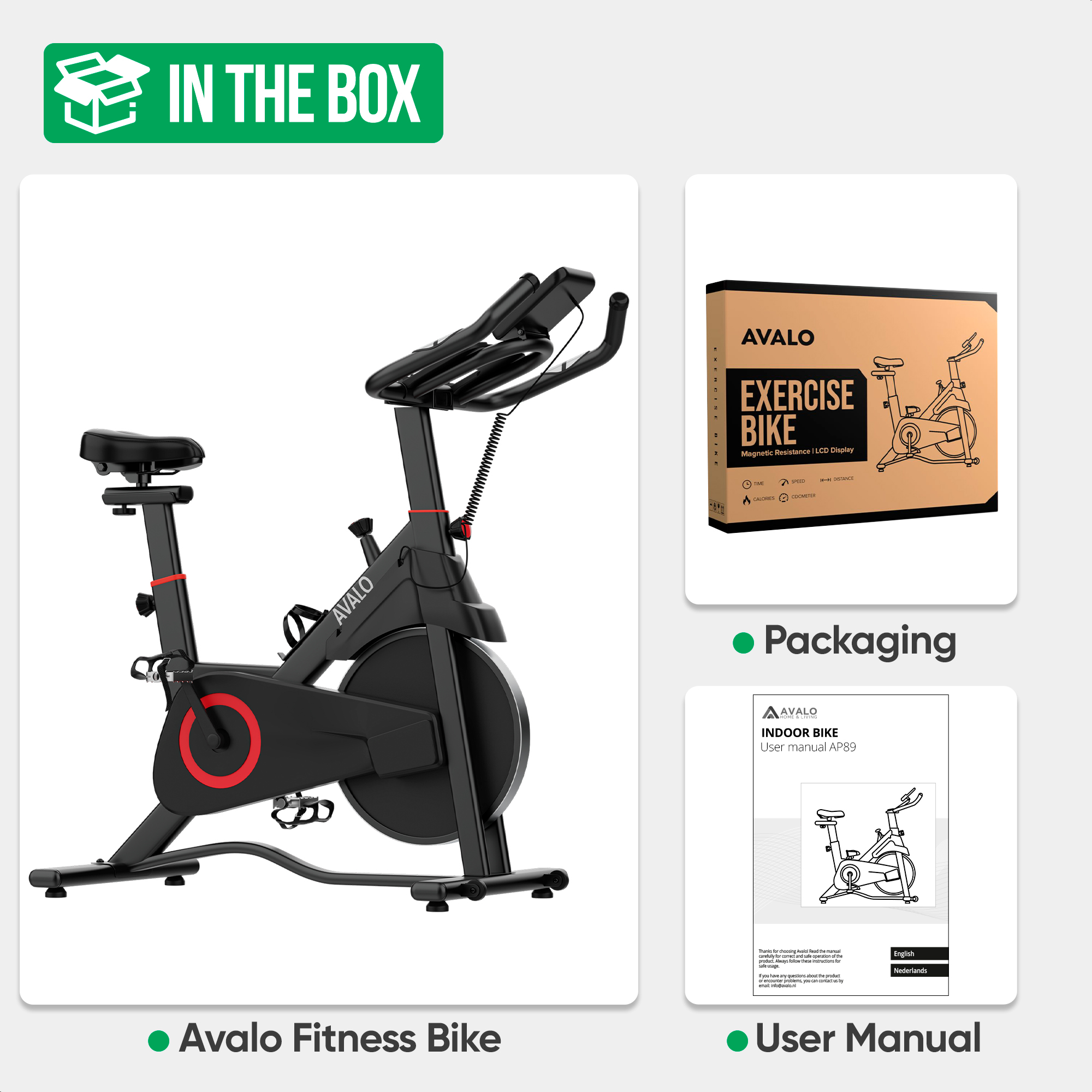 Een hometrainer met verpakking en gebruikershandleiding. De fiets is zwart met rode accenten. De achtergrond is wit.