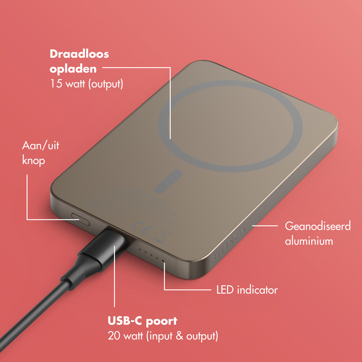 Een gouden draadloze oplader met een zwarte kabel aangesloten. Het heeft een aan/uit-knop, een LED-indicator en is gemaakt van geanodiseerd aluminium.