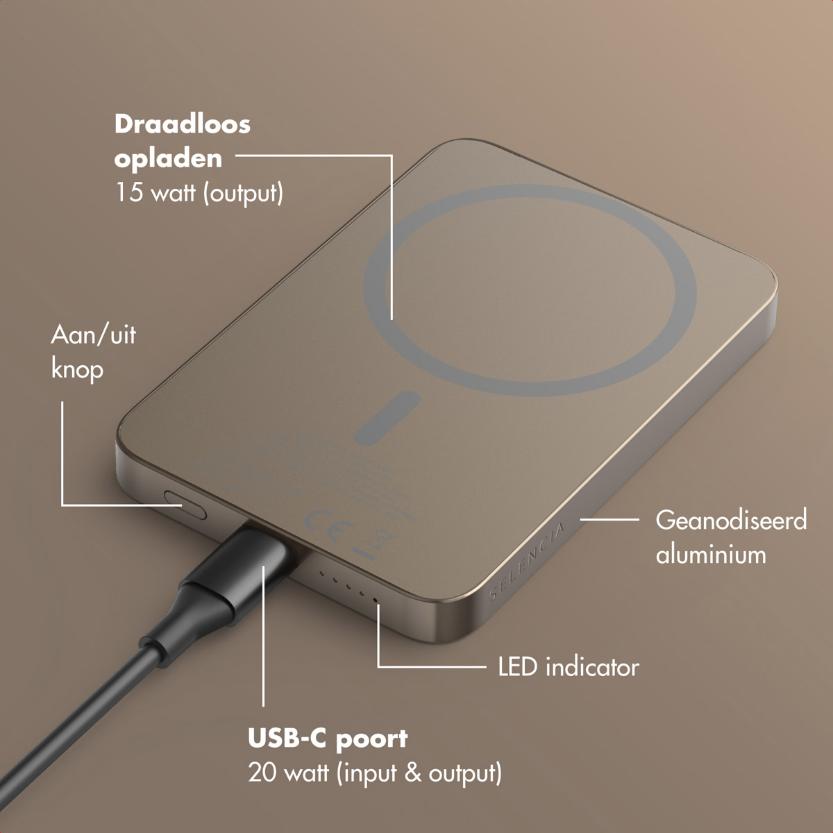 Een gouden draadloze oplader met een zwarte USB-C-kabel. Labels identificeren onderdelen: aan/uit-knop, LED-indicator en aluminium.