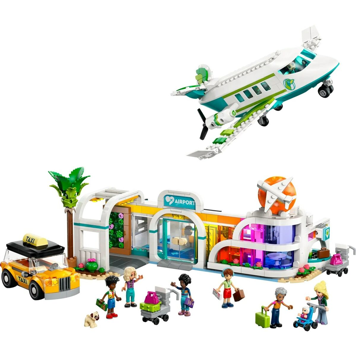 Una scena dell'aeroporto Lego con un aereo, un taxi, un edificio e diverse figure. Le figure tengono i bagagli e c'è un cane.