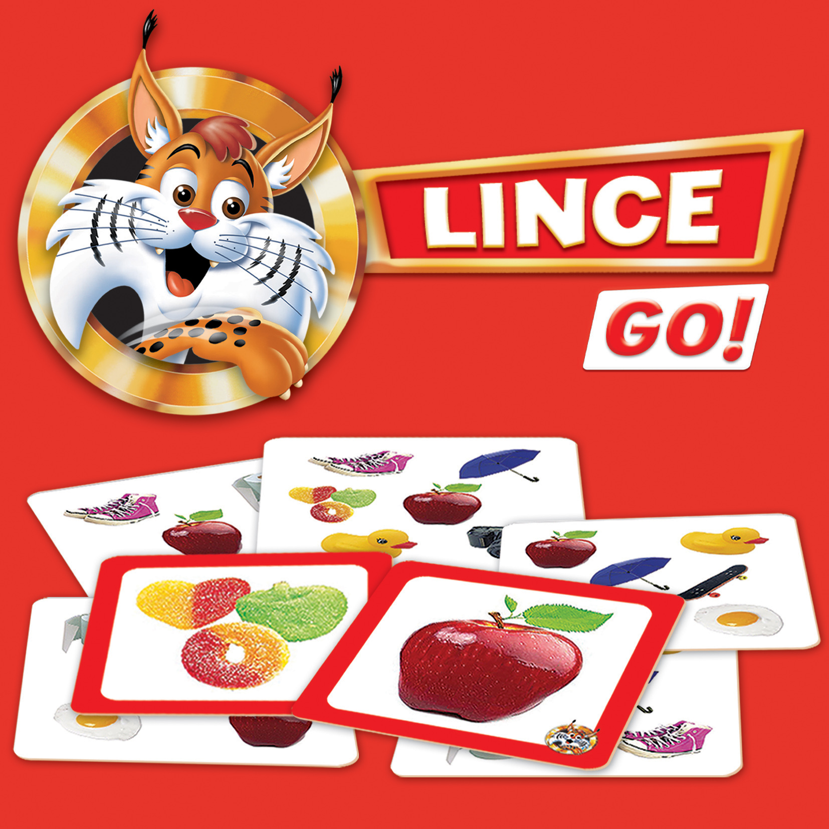 La imagen muestra una caja de juego con un lince de dibujos animados, cartas con imágenes de objetos y el texto "LINCE GO!".