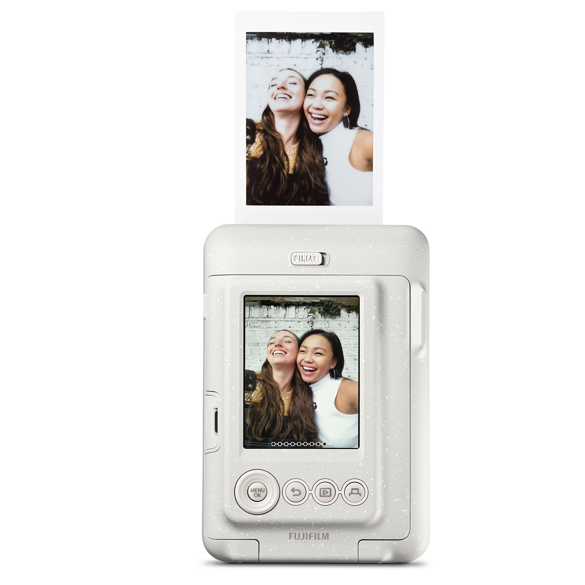 İki gülen kadının fotoğrafının olduğu beyaz bir Fujifilm Instax yazıcı. Fotoğraf yazıcının ekranında da var.