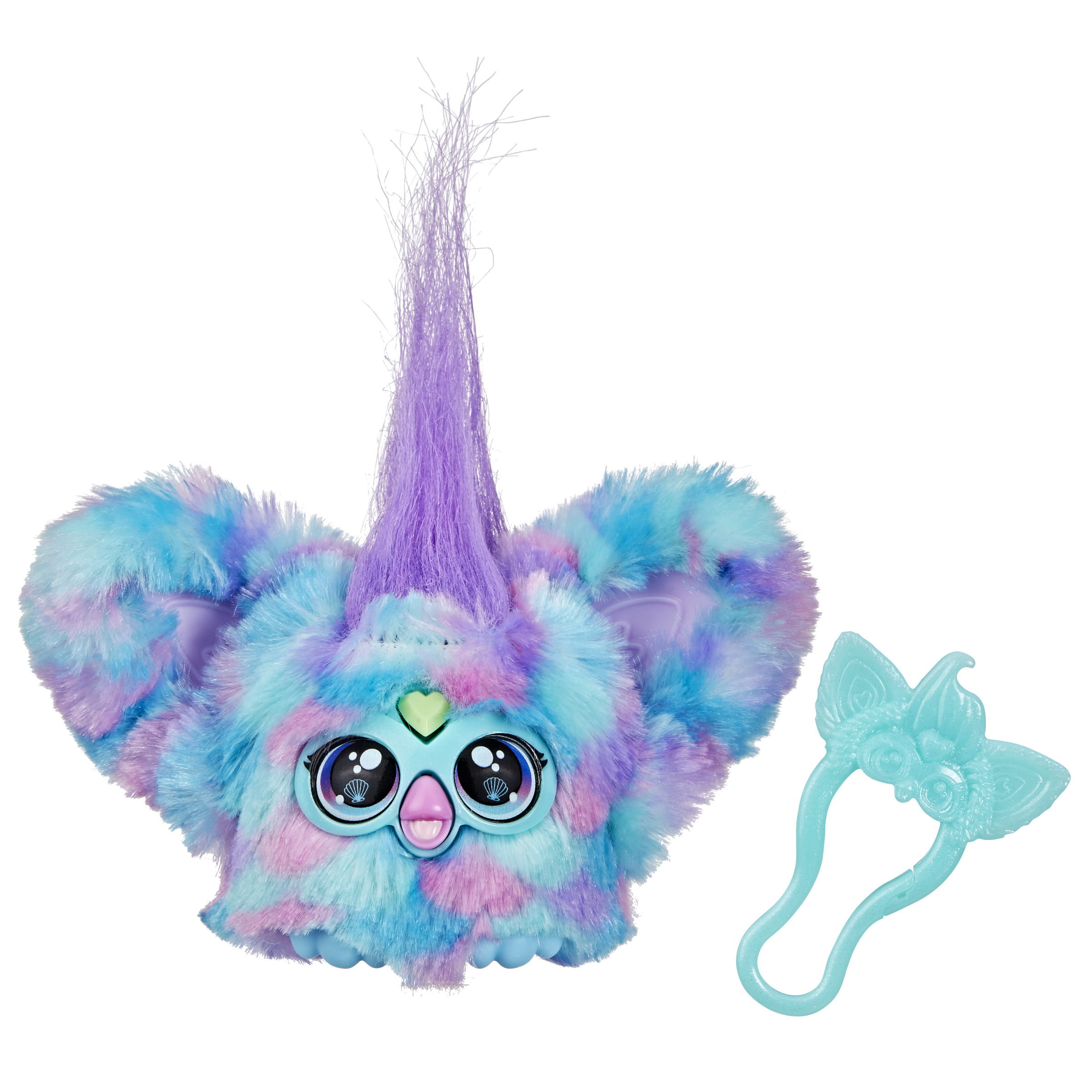 Un juguete de peluche colorido con cresta morada y accesorio verde azulado. El juguete tiene ojos grandes y un corazón.