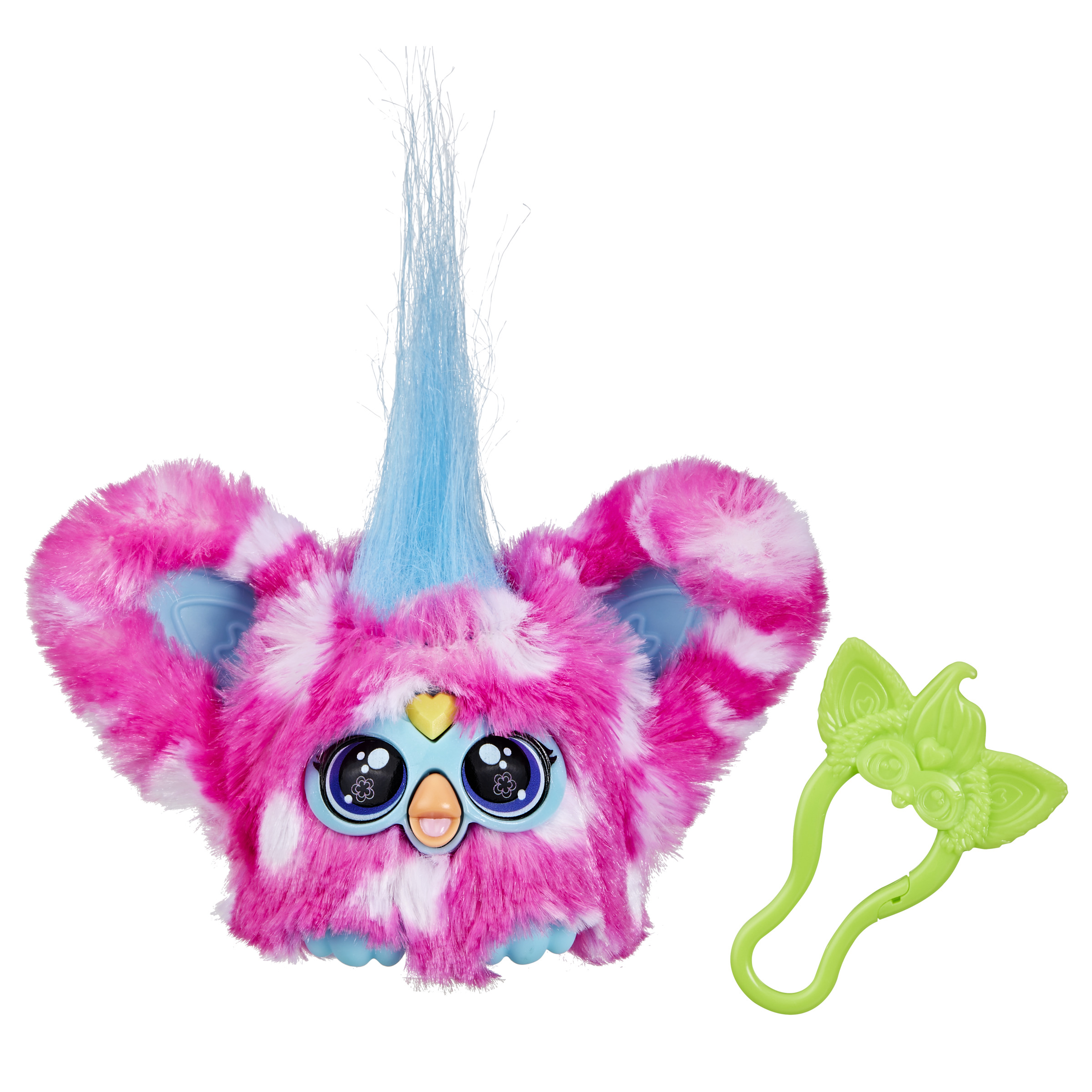 Un juguete Furby rosa y blanco con pelo y ojos azules, con un accesorio verde.