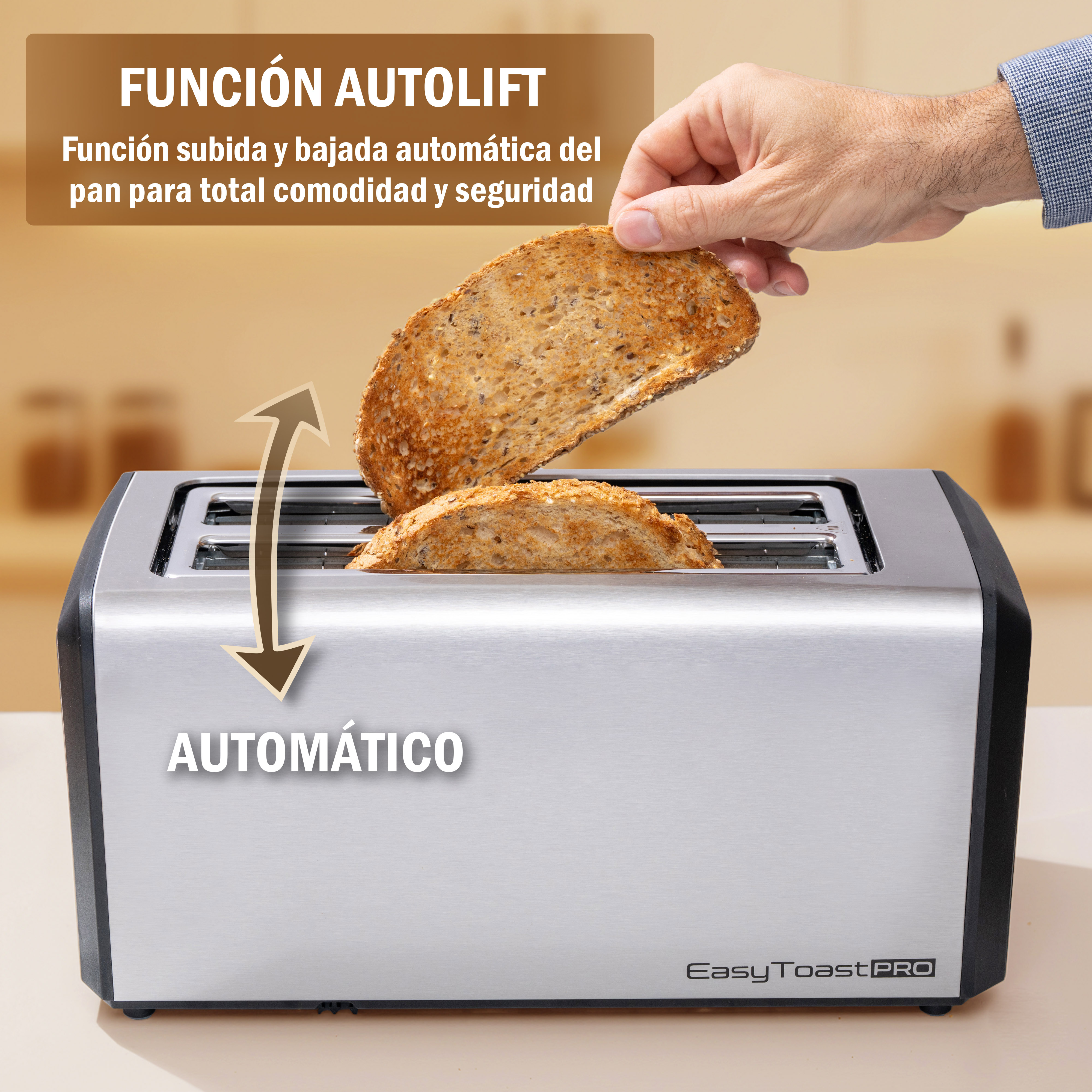 Una mano levanta tostadas de una tostadora. El texto dice 'AUTOLIFT'. La tostadora es plateada.