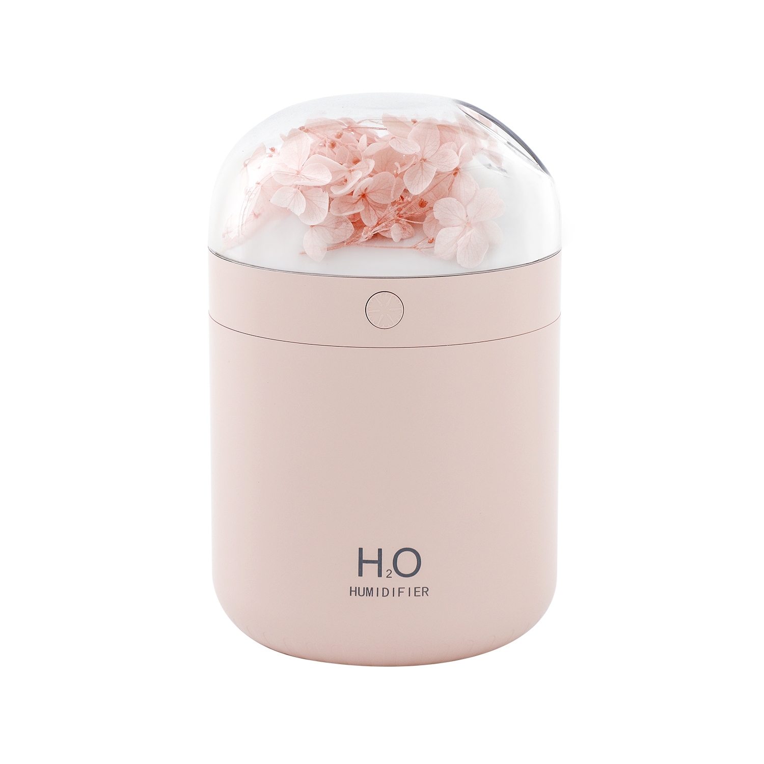 Ein rosa Luftbefeuchter mit einer klaren Kuppel, die mit rosa Blumen gefüllt ist. Auf der Basis steht H2O HUMIDIFIER. Ein Knopf ist sichtbar.