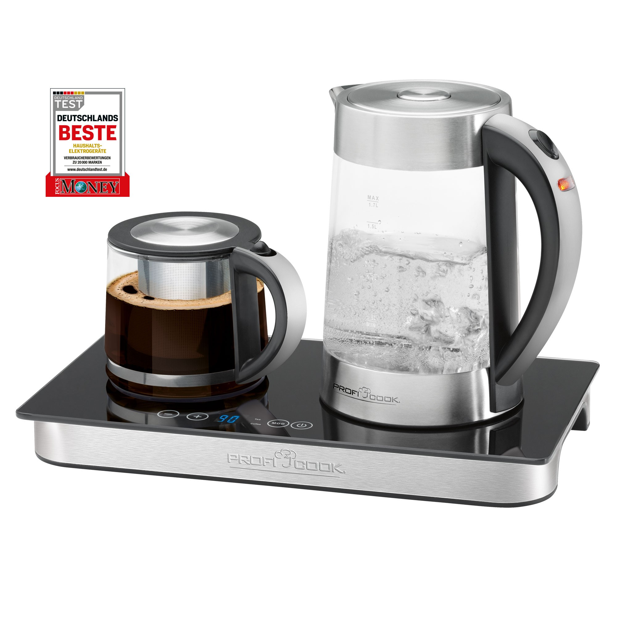 Czajnik elektryczny i ekspres do herbaty na czarnej podstawie. Woda w czajniku. Herbata w szklance. Niemiecka nagroda testowa po lewej.