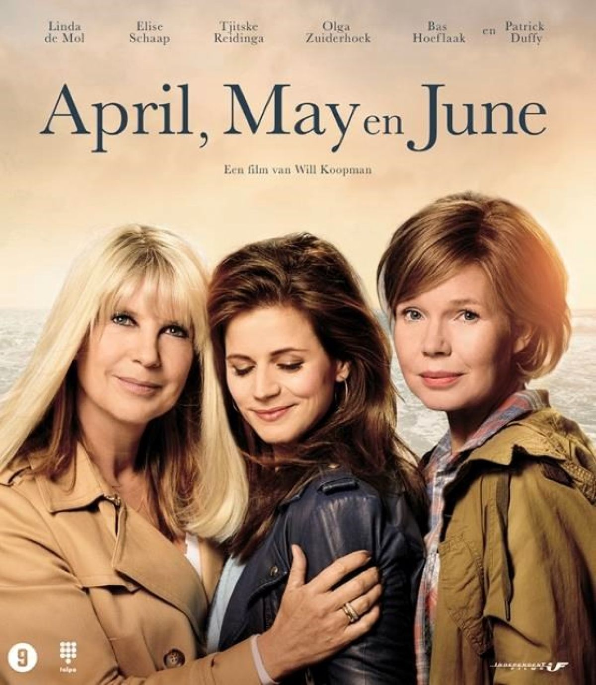 Filmposter voor 'April, May en June'. Drie vrouwen glimlachen op de voorgrond. De achtergrond heeft een bewolkte, lichte lucht.