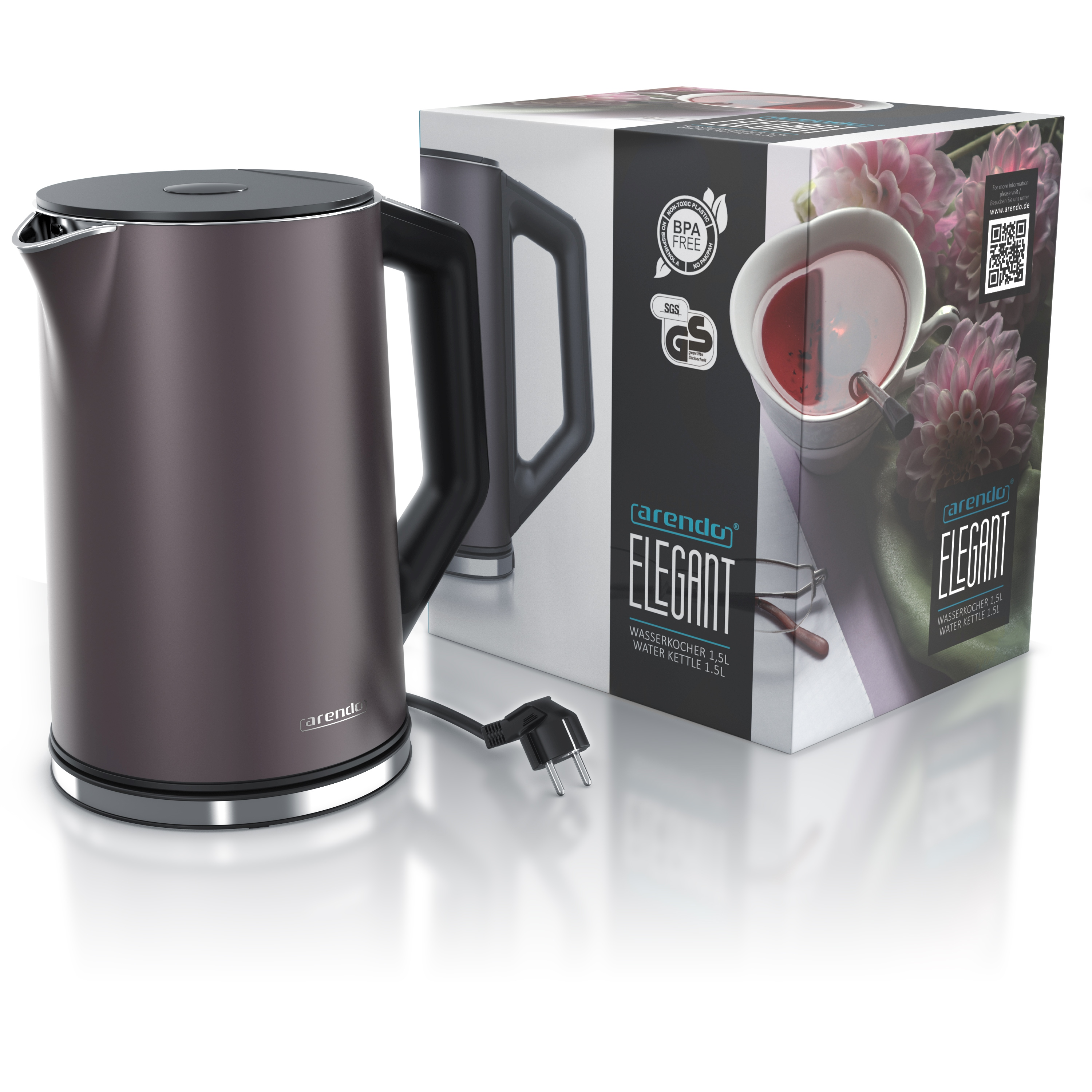 Ein moderner Wasserkocher neben seiner Schachtel, beide in Dunkelgrau. Die Schachtel zeigt eine Tasse Tee und Blumen.