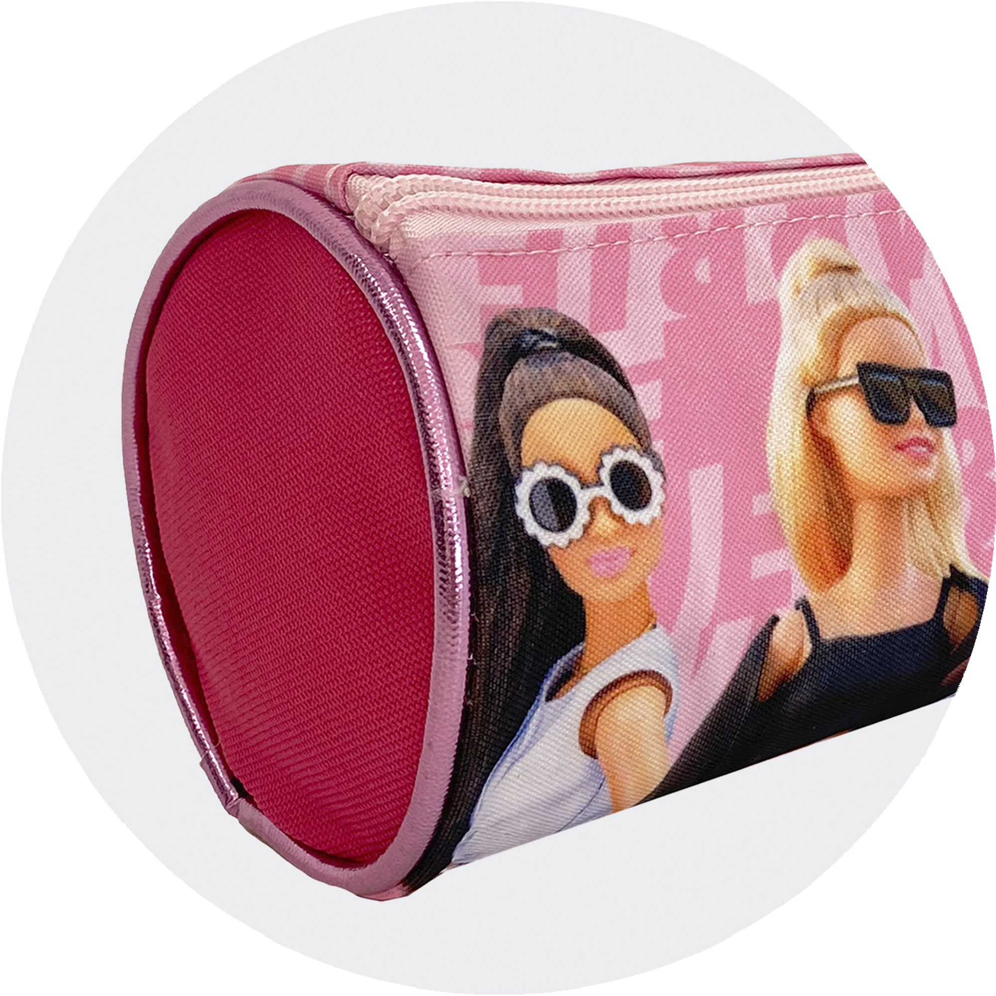 Estuche rosa con muñecas Barbie. Una muñeca tiene gafas de sol, la otra gafas de sol negras.