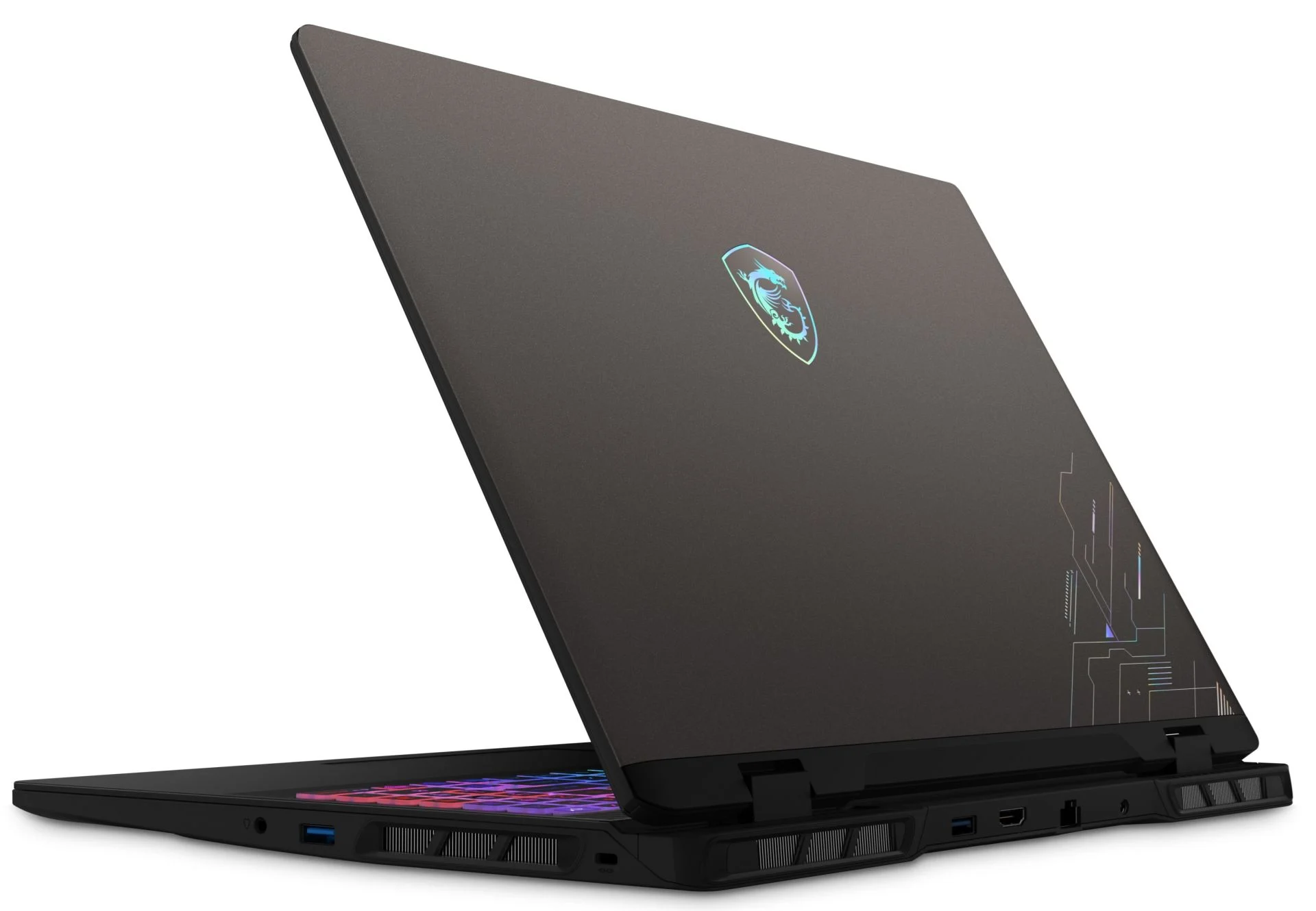 Koyu gri bir MSI dizüstü bilgisayar açık. Kapakta bir logo ve çizgiler var. Klavyede renkli ışıklar yanıyor.
