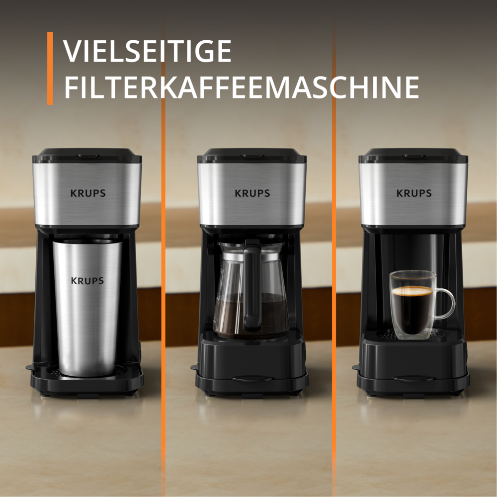 Tre macchine da caffè Krups. La prima ha una tazza di metallo, la seconda una caraffa di vetro e la terza una tazza di vetro.