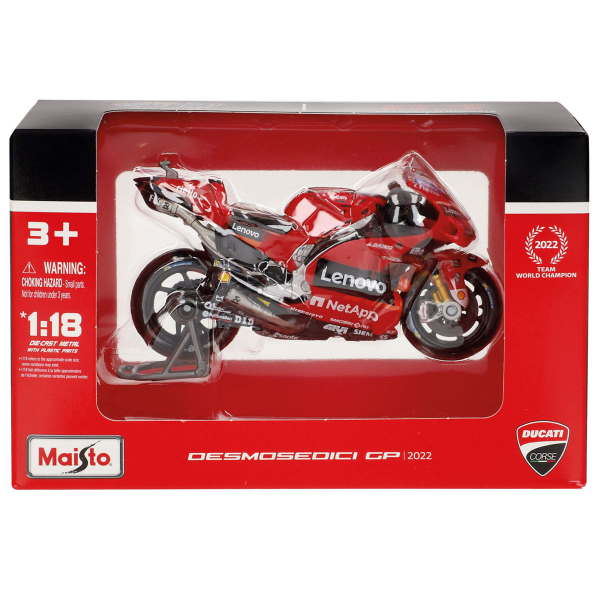 Un modelo rojo Ducati Desmosedici GP 2022 en una caja negra y roja. La caja incluye advertencias y logotipos de marcas.