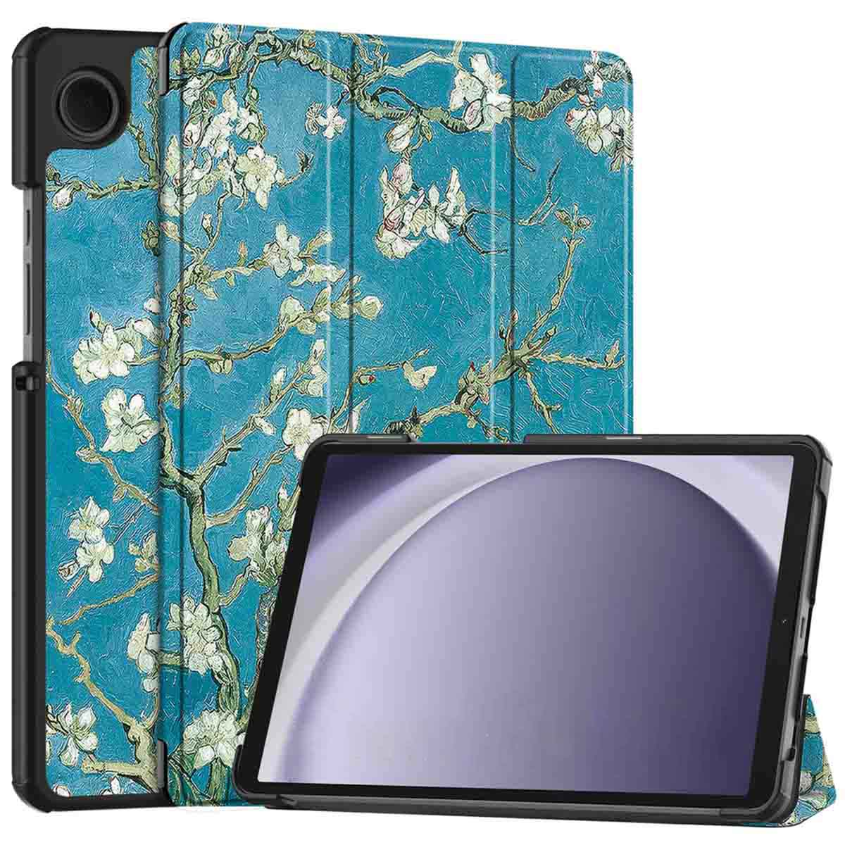Tablette avec étui à motifs floraux. Fond bleu avec fleurs et branches blanches. Cadre et écran de tablette noirs visibles.