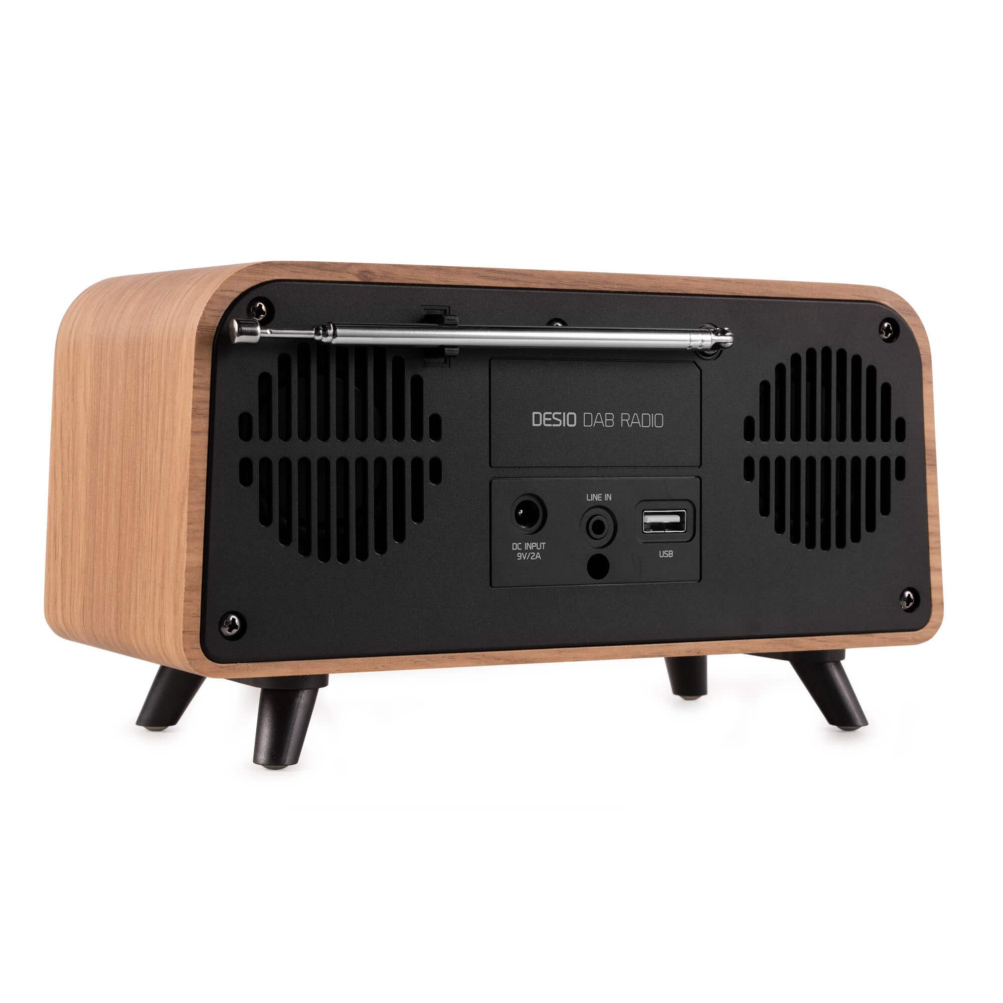 Holzradio mit schwarzer Rückwand. Merkmale sind Antenne, Lautsprechergitter und Eingangsanschlüsse.