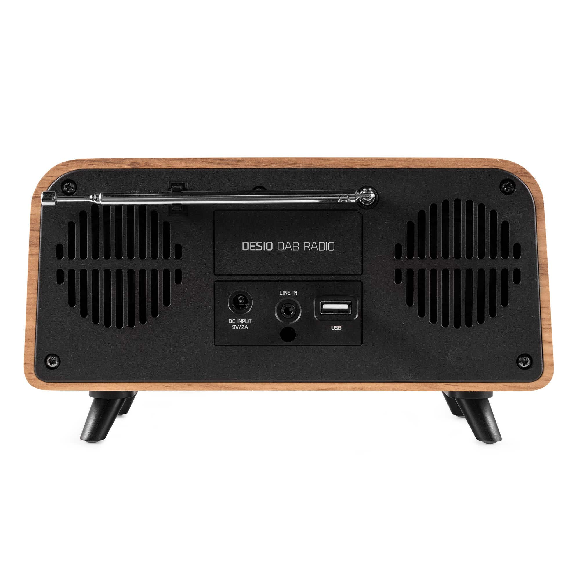 Holzradio mit schwarzer Frontplatte. Enthält Lautsprechergitter, Antenne und Eingangsanschlüsse. Steht auf schwarzen Beinen.