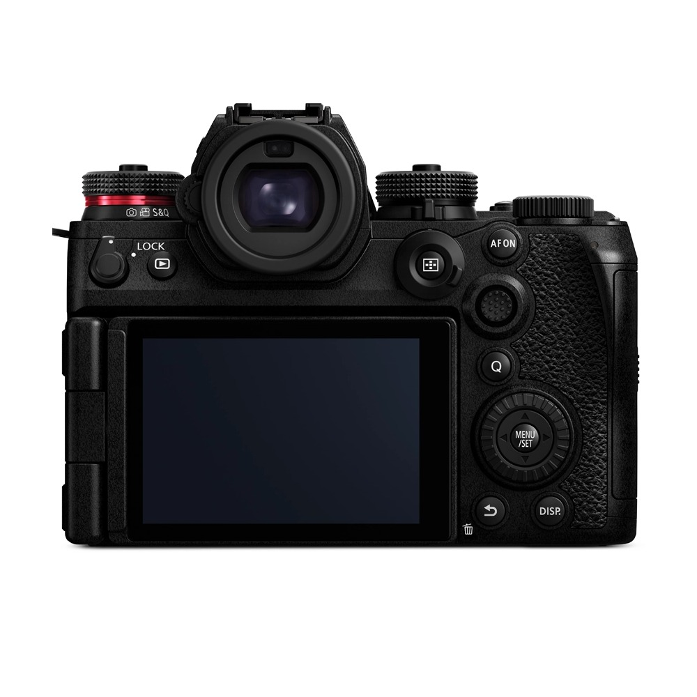 A black camera with buttons, a screen, and a lens. It has red accents on the dials. The camera is against a white background.