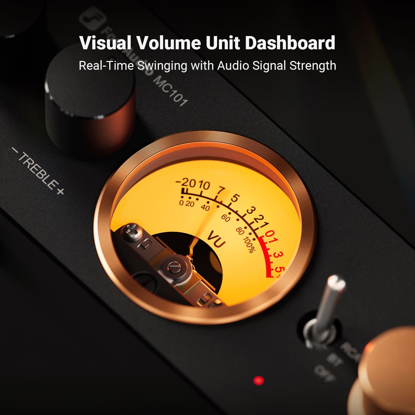 Close-up of a VU meter with a needle, labeled numbers, and a red light. Black surface with gold accents.