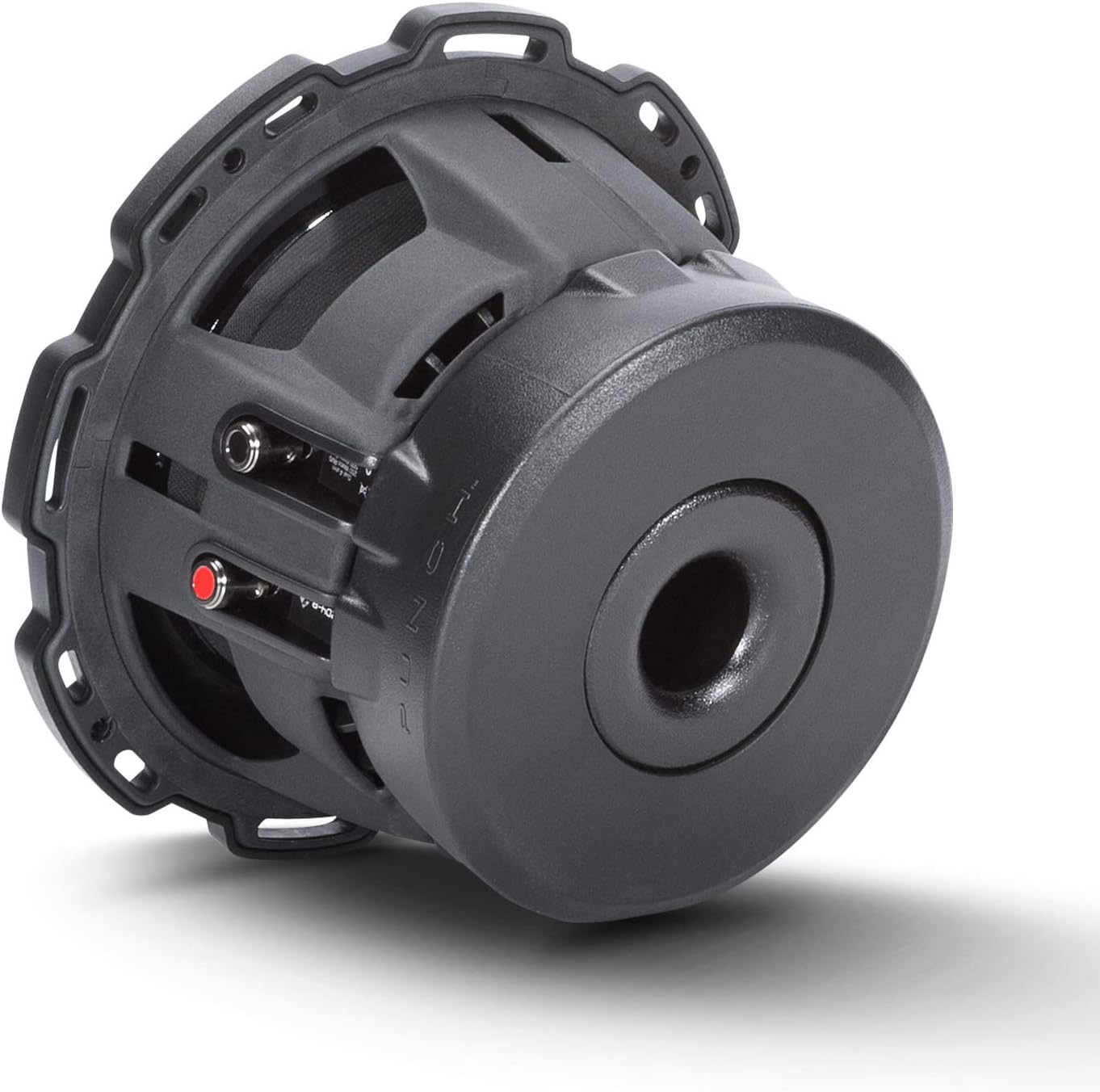 Ein schwarzer Subwoofer mit einem zentralen Konus und einer umliegenden Käfigstruktur. Roter Knopf sichtbar. Vor weißem Hintergrund mit Schatten.
