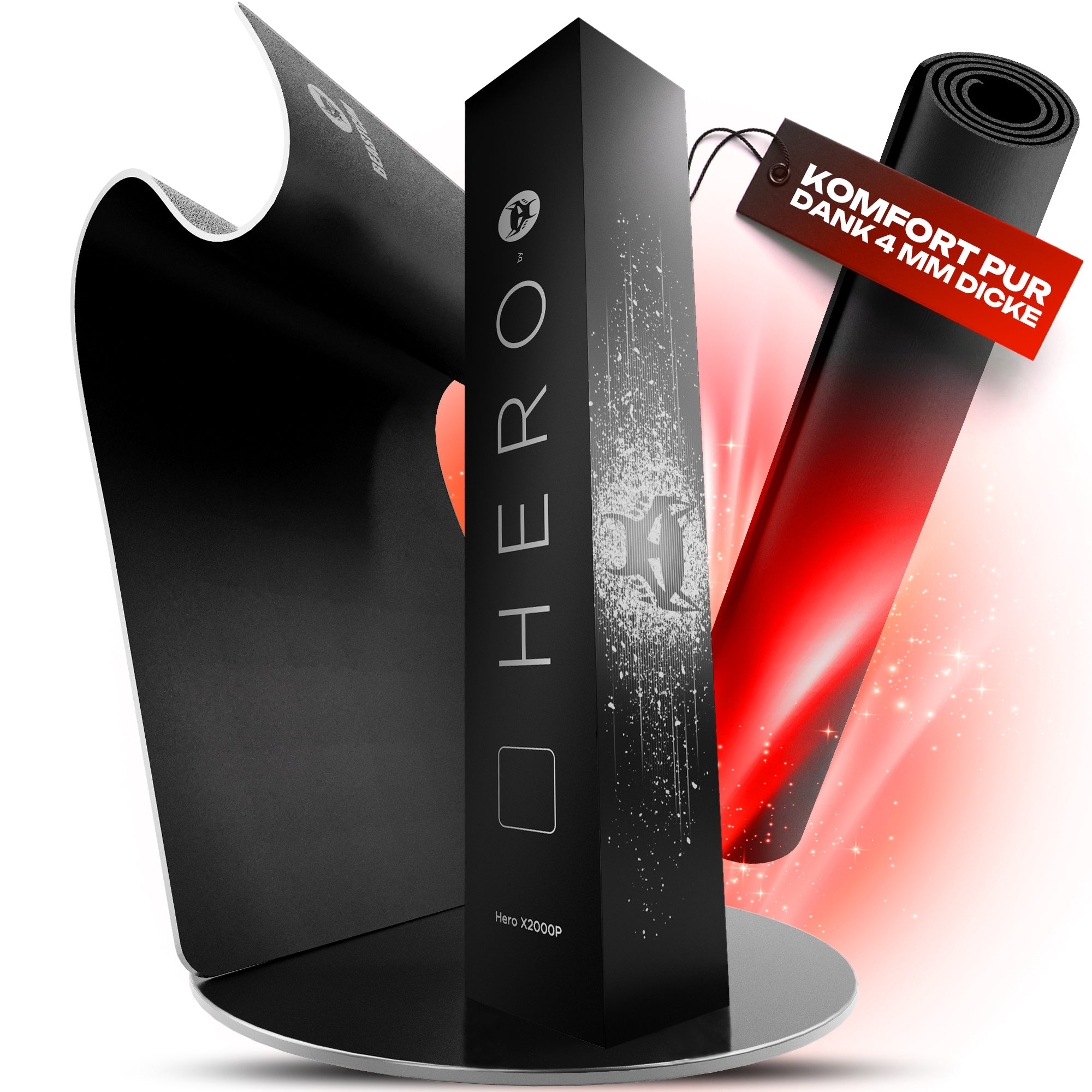 Czarne pudełko z napisem 'HERO', etykietą produktu i zwiniętą matą. Etykieta głosi 'COMFORT PURE'.