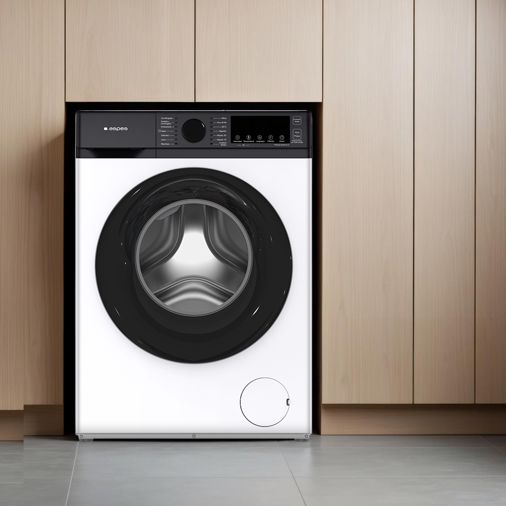 Biała pralka z czarnymi drzwiami, wbudowana w drewniane szafki. Pralka ma panel sterowania i okrągłe szklane drzwi.