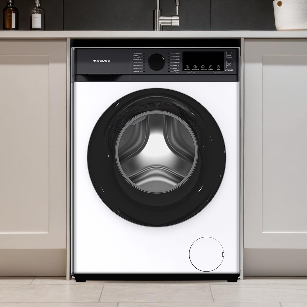 Biało-czarna pralka jest wbudowana w szafkę. Maszyna ma czarne drzwi i panel sterowania.