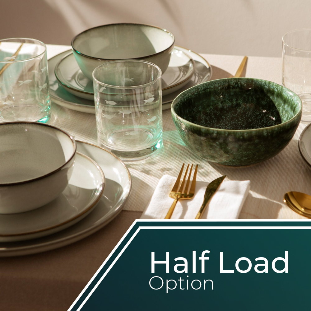 Mesa con cuencos, platos, vasos y cubiertos. Tonos verdes y blancos. Texto 'Half Load Option' abajo.