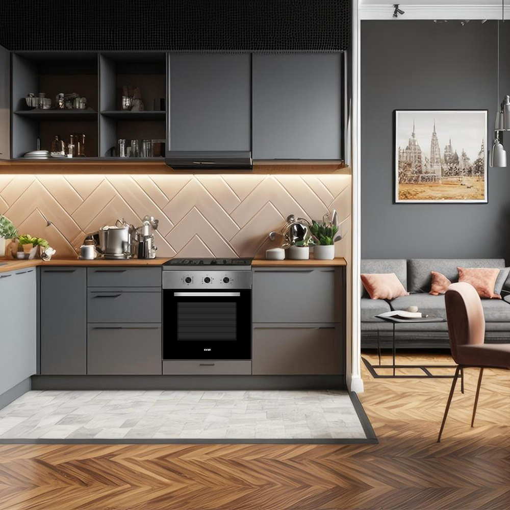 Cocina moderna con gabinetes grises, horno y salpicadero en espiga. Salón con sofá gris y arte de fondo.