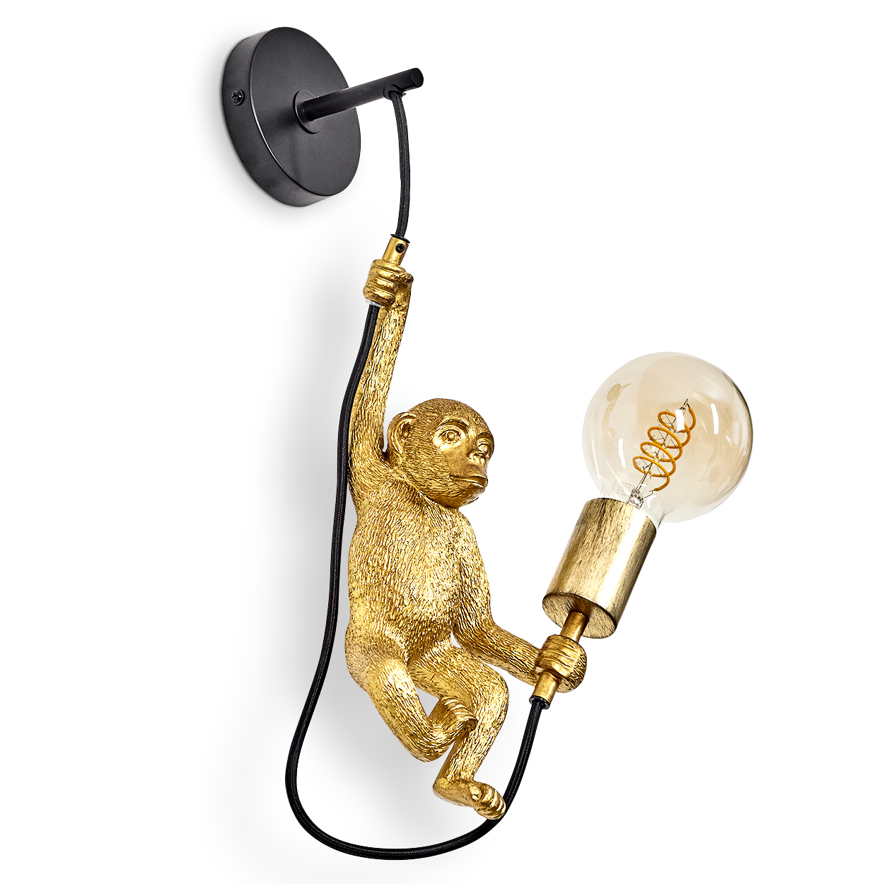 Eine goldene Affenlampe hängt an einer schwarzen Halterung. Der Affe hält eine Glühbirne.